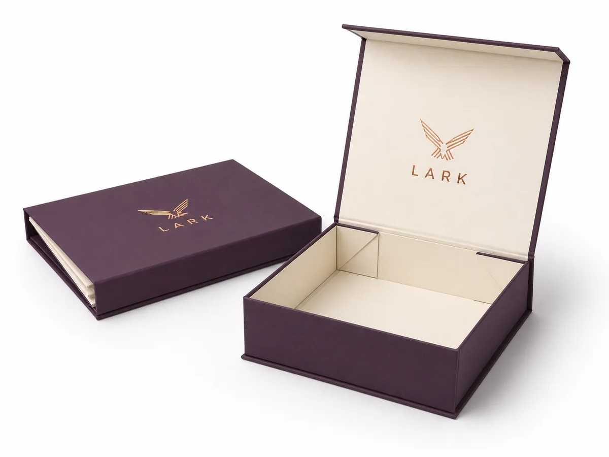 Collapsible rigid gift box shown assembled and folded flat